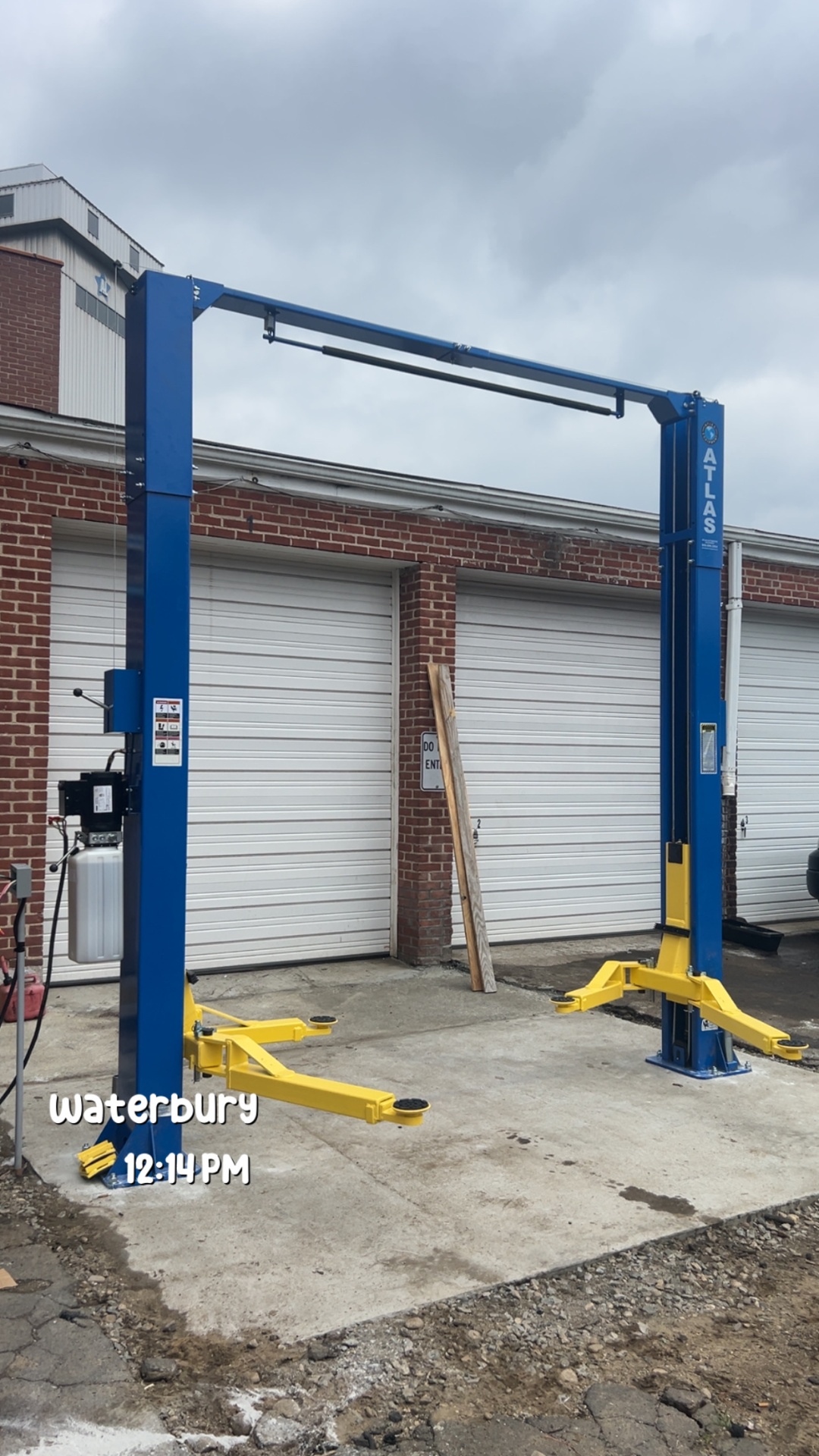 Blue two-post lift installed in Waterbury, CT